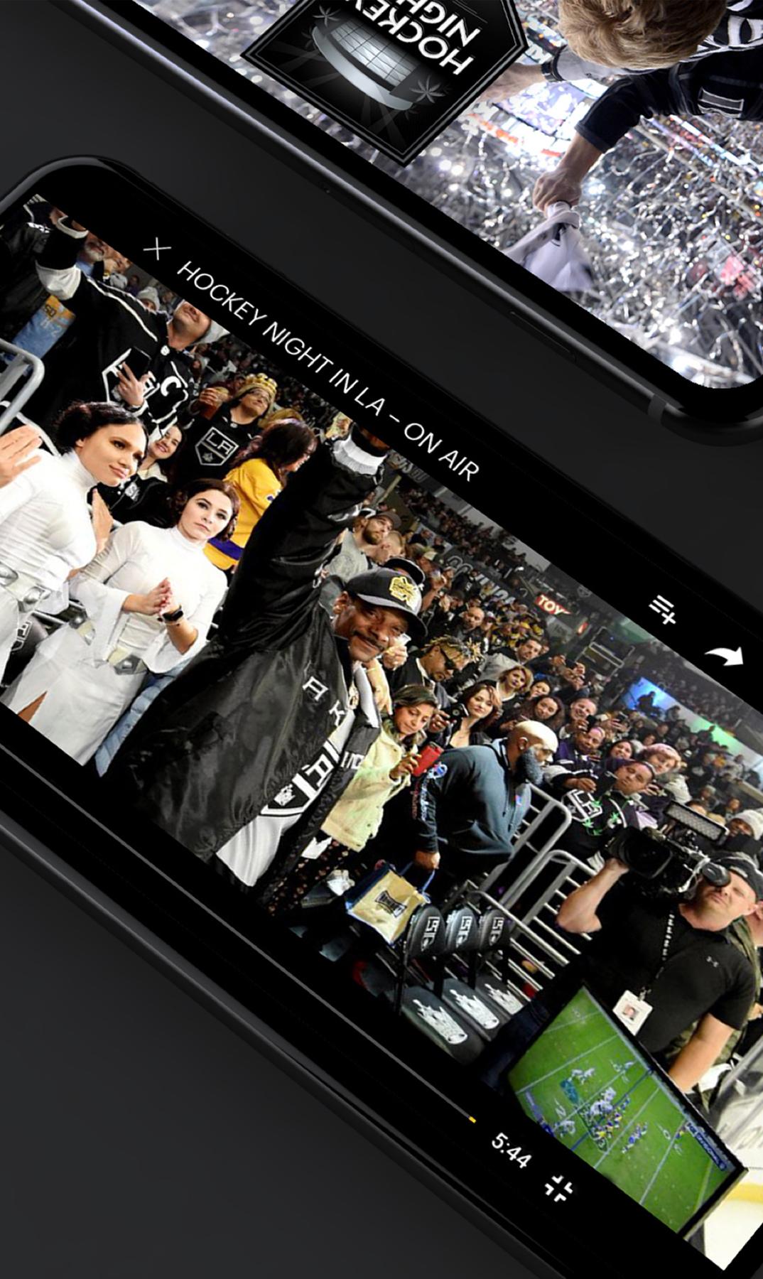 Phones playing Hockey Night in LA arena footage on a dark surface
