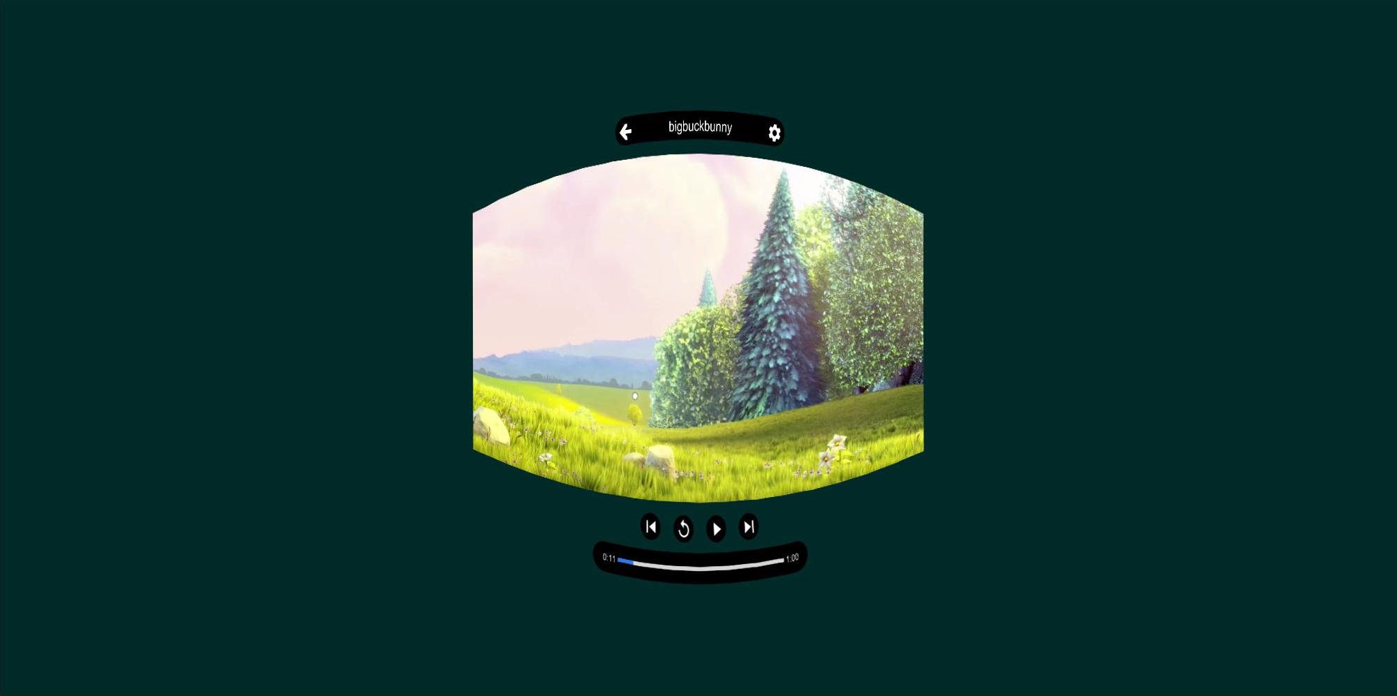 Small curved media player showing a bright landscape with hills and trees on a dark green background