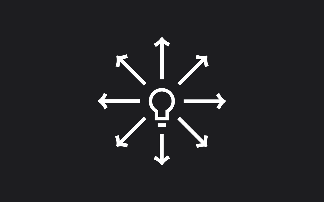White lightbulb icon with arrows radiating outward on a dark background