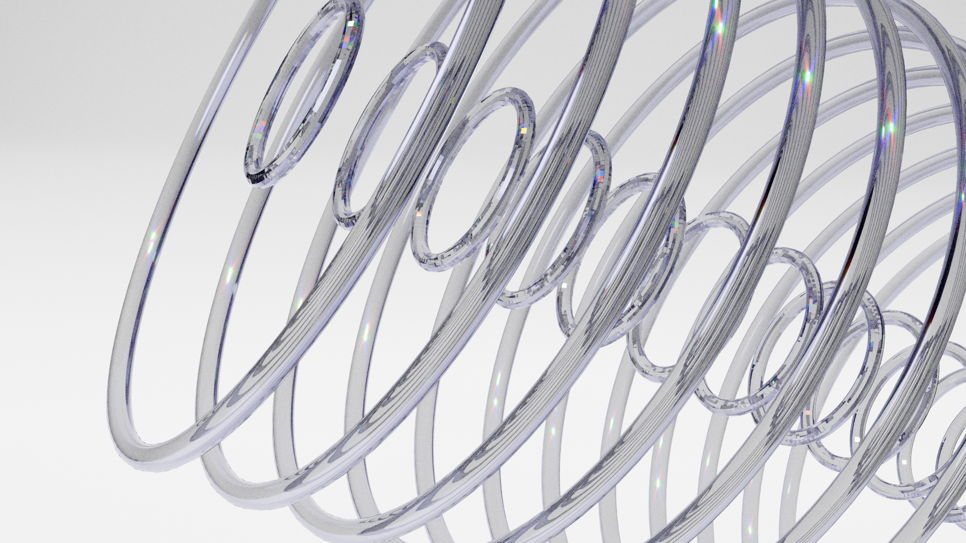 Close-up of transparent glass spirals on a light background