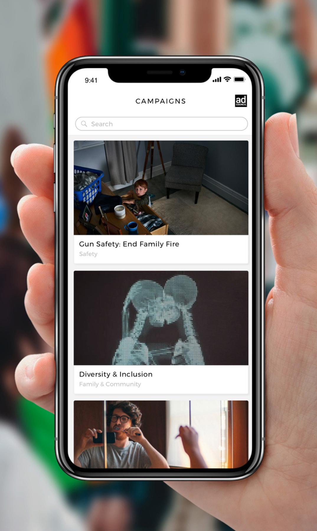 Hand holding a phone with campaign cards beside floating issue tiles