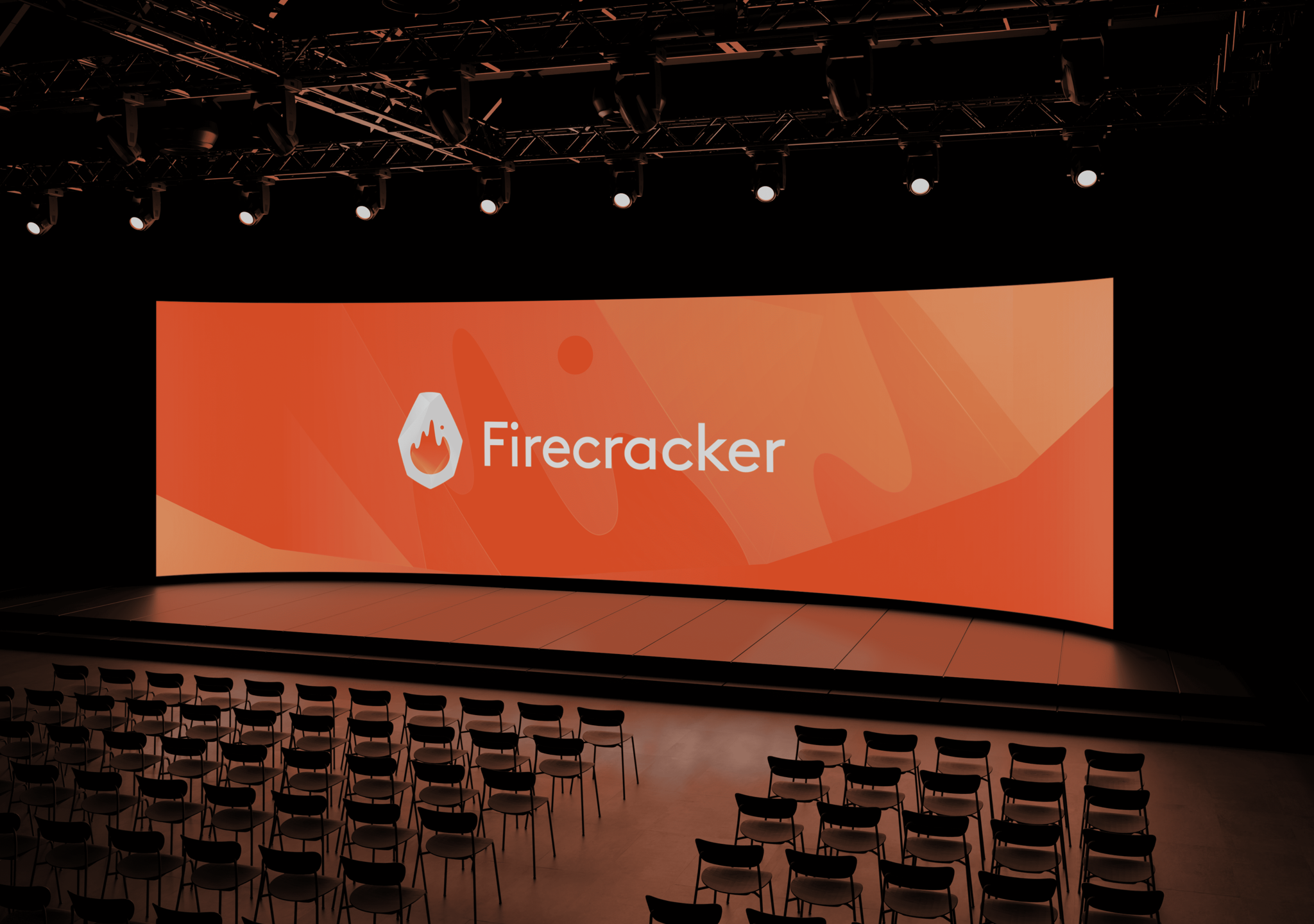 Firecracker logo on a curved auditorium screen above rows of empty chairs