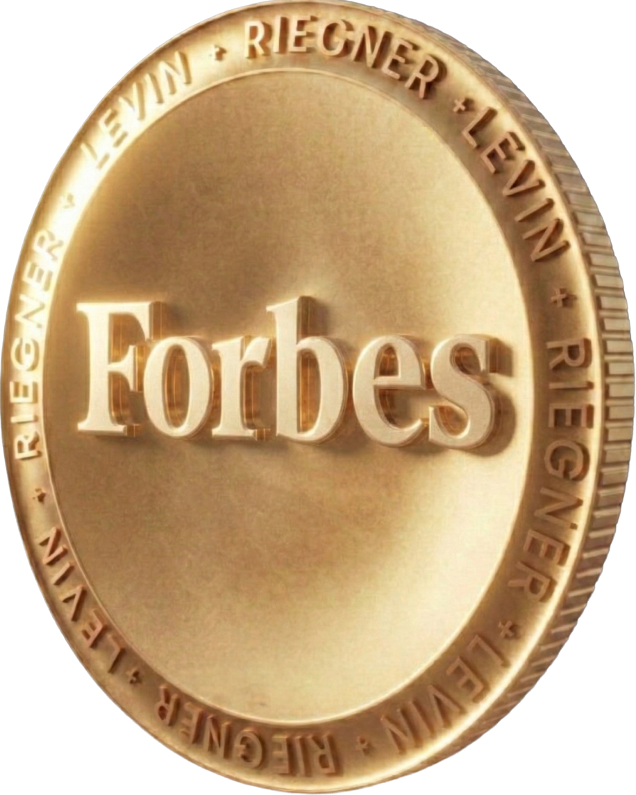 Gold coin trophy with Forbes logo and Riegner Levin text