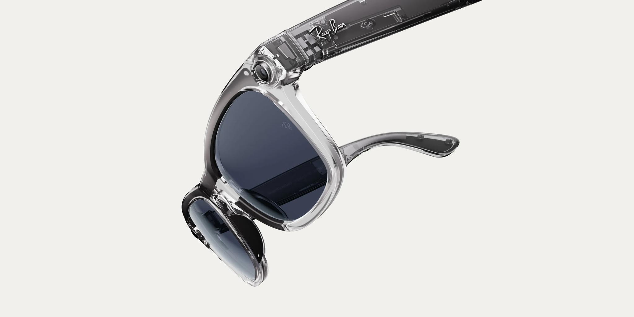 Transparent smart glasses with dark lenses on a light background