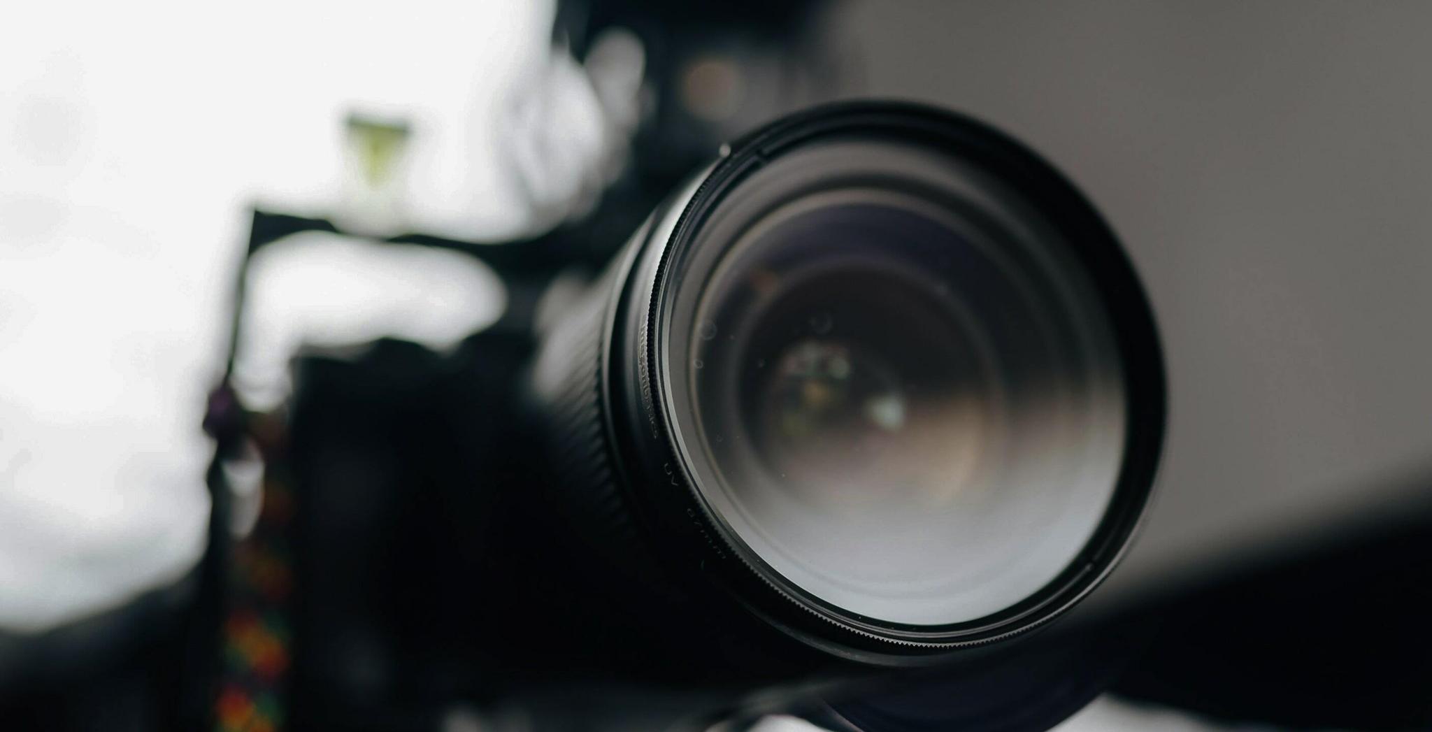 Media 2 min Close-up of a camera lens with a blurred background