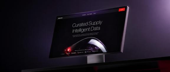 Case Banner Desktop Wide monitor displaying a dark presentation slide about curated supply intelligence data