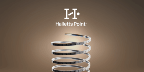 Halletts Point Halletts Point logo above a metallic spiral band on a brown gradient background