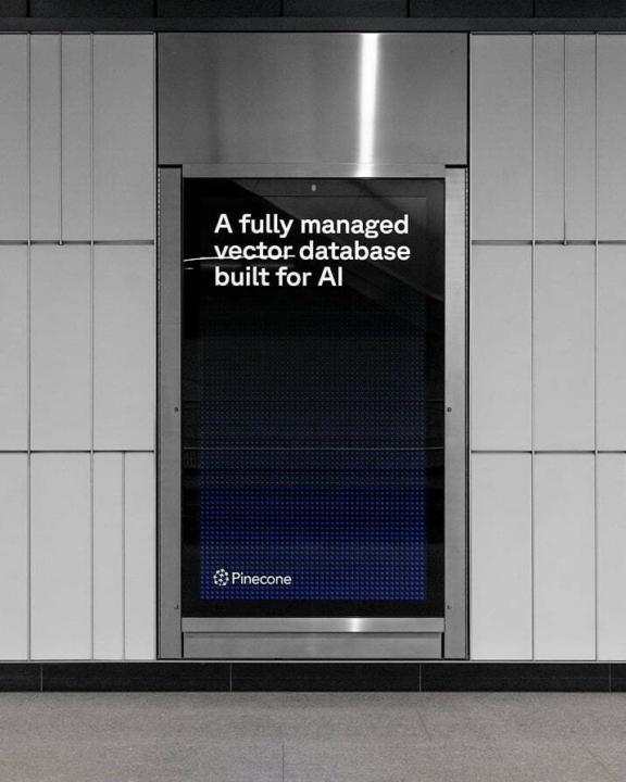 Pinecone Mobile Cover Pinecone wall display reading "A fully managed vector database built for AI."