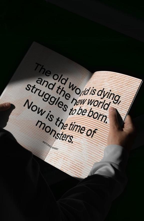 Rainbow Paper Mobile Cover Hands holding an open book with a large quote about the old world dying