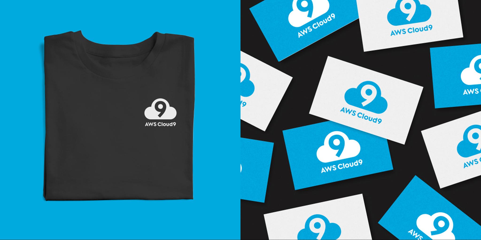 AWS Cloud9 branded cards scattered beside a folded black AWS Cloud9 T-shirt