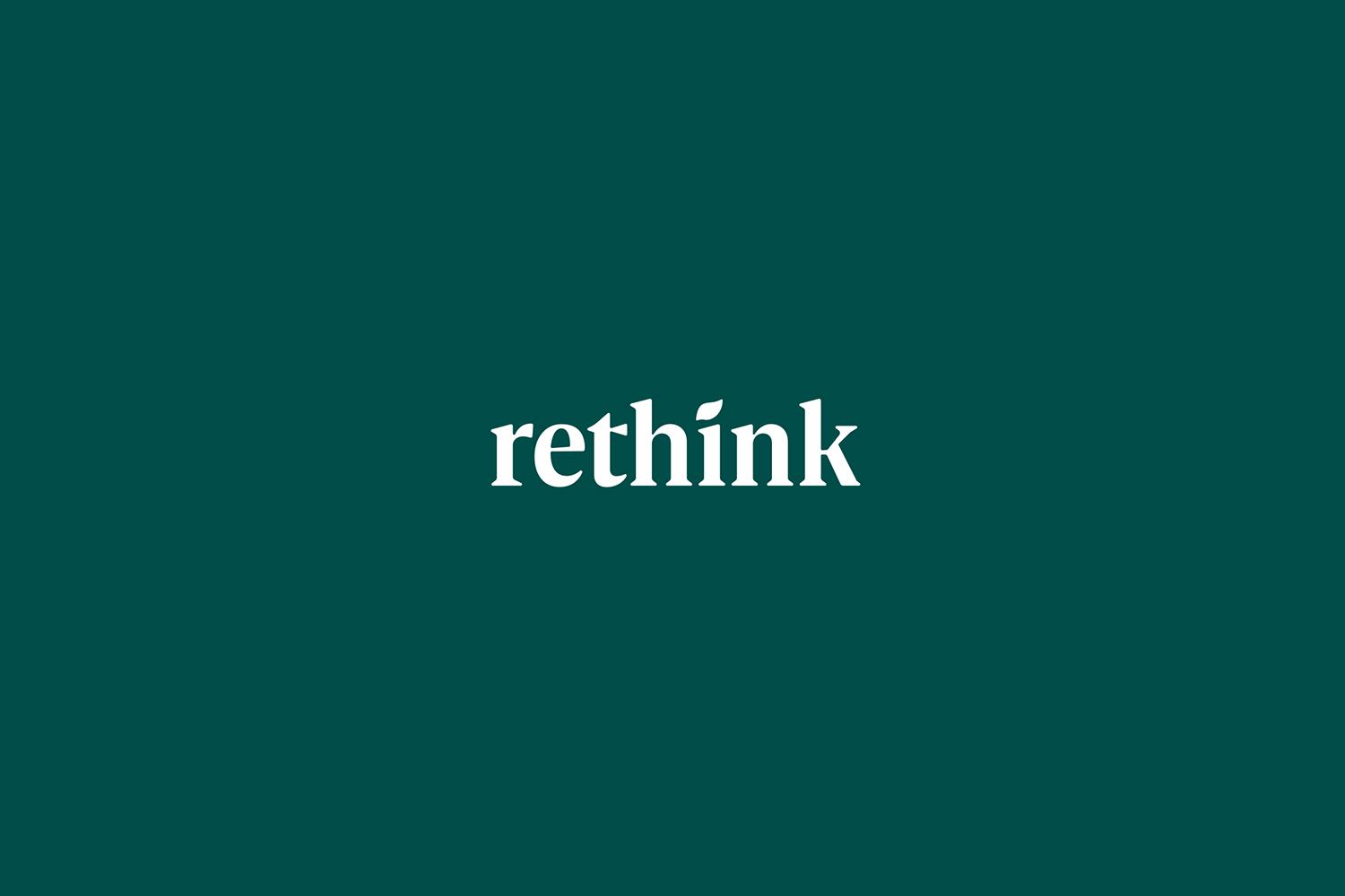 White rethink wordmark centered on a dark green background