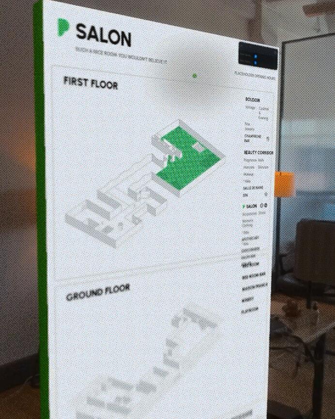Close-up of a floating Salon wayfinding map in an office setting.
