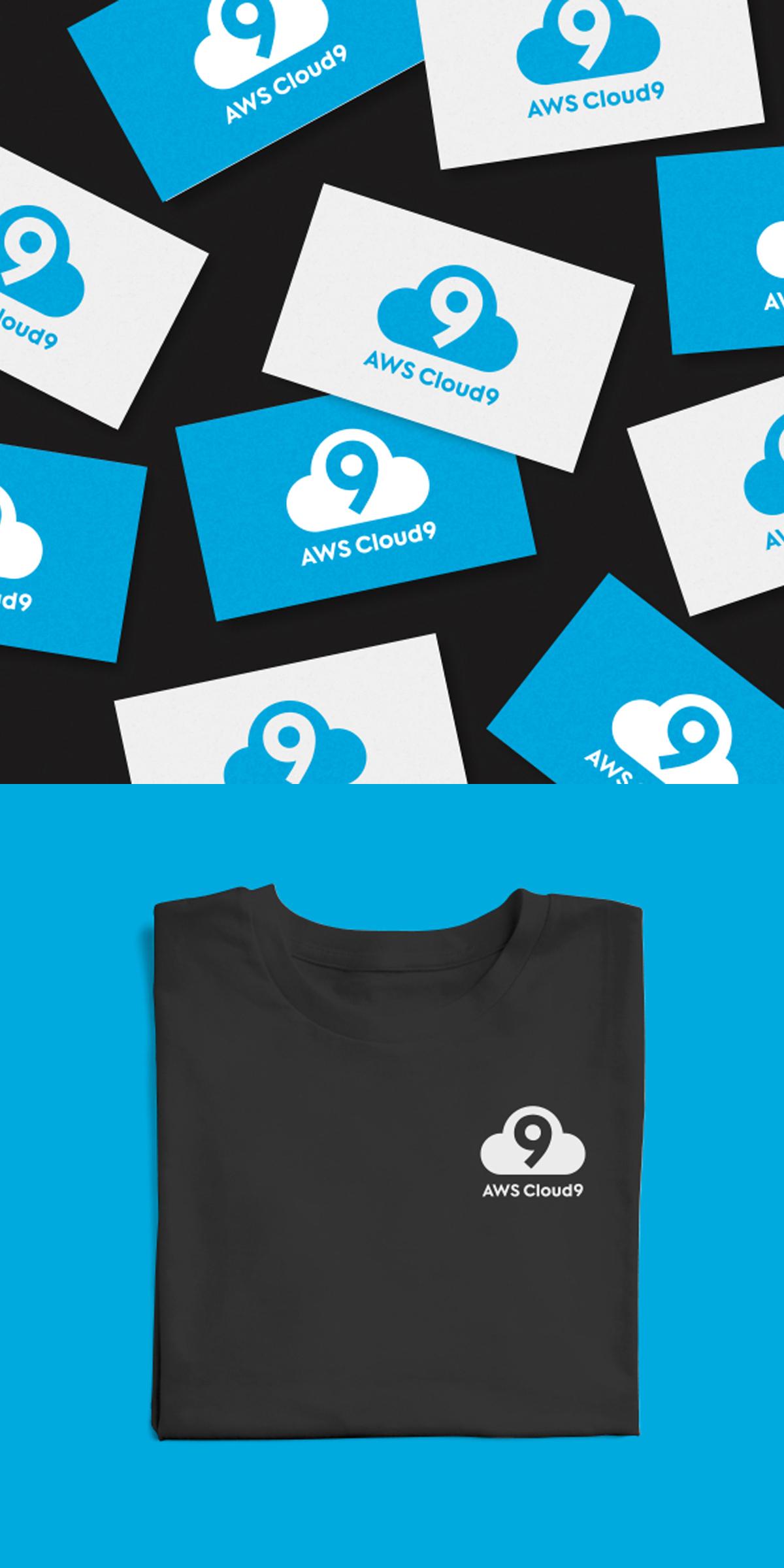 AWS Cloud9 branded cards scattered beside a folded black AWS Cloud9 T-shirt