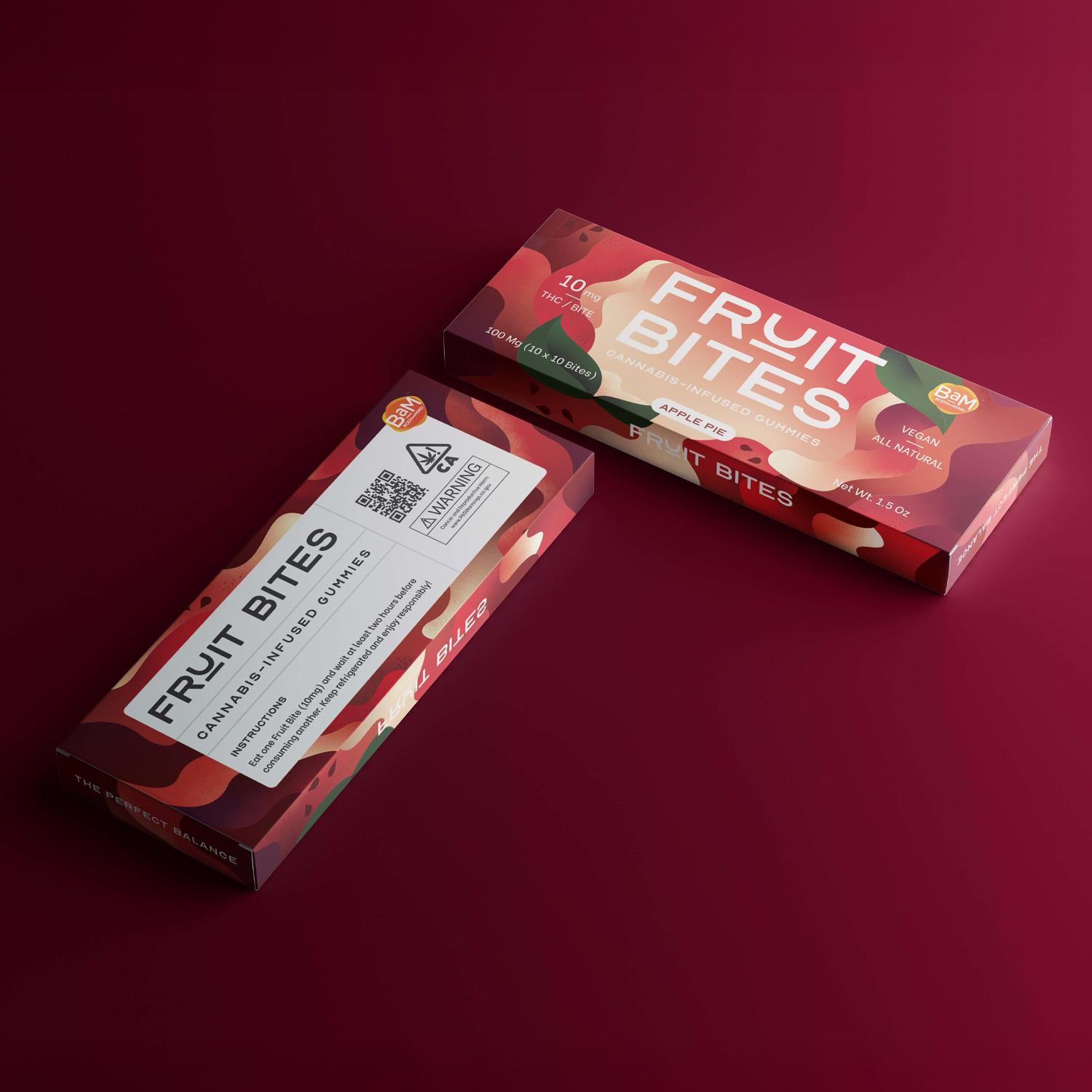 Two Fruit Bites apple pie cannabis gummy boxes on a burgundy background