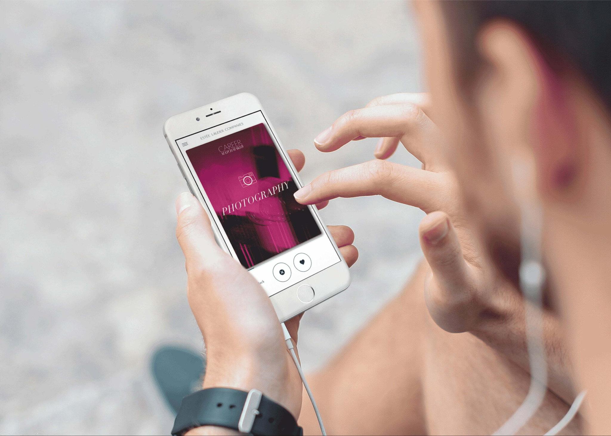 Person tapping the Photography screen of the Estee Lauder Companies Career Matchmaker on an iPhone