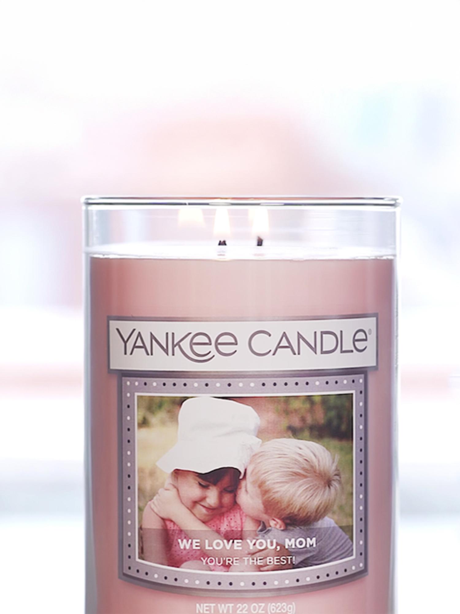 Personalised Yankee Candle jar with a photo label reading "We love you, Mom"