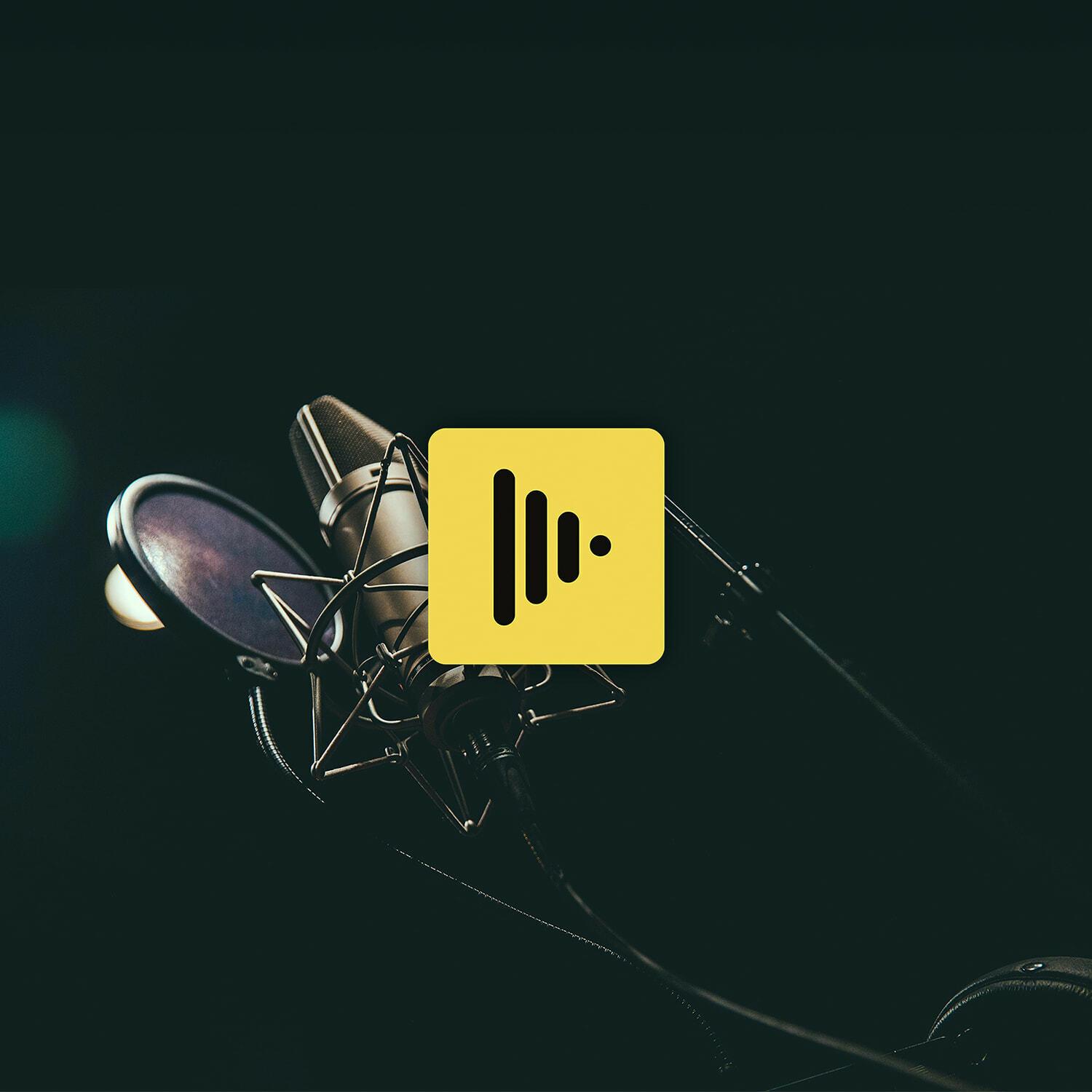 Studio microphone with yellow audio waveform icon overlay