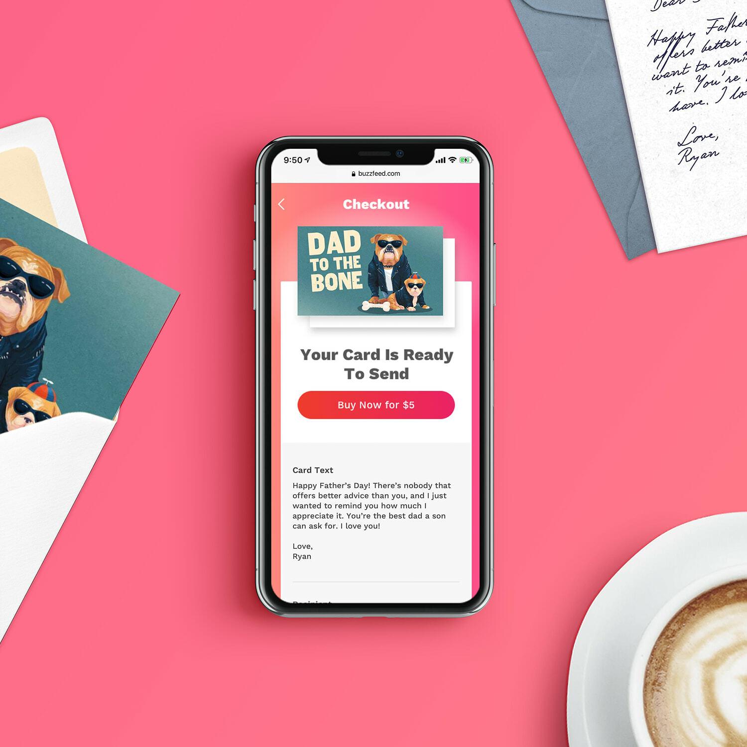 Phone on buzzfeed.com checking out a Dad to the Bone card, beside the printed card and handwritten note