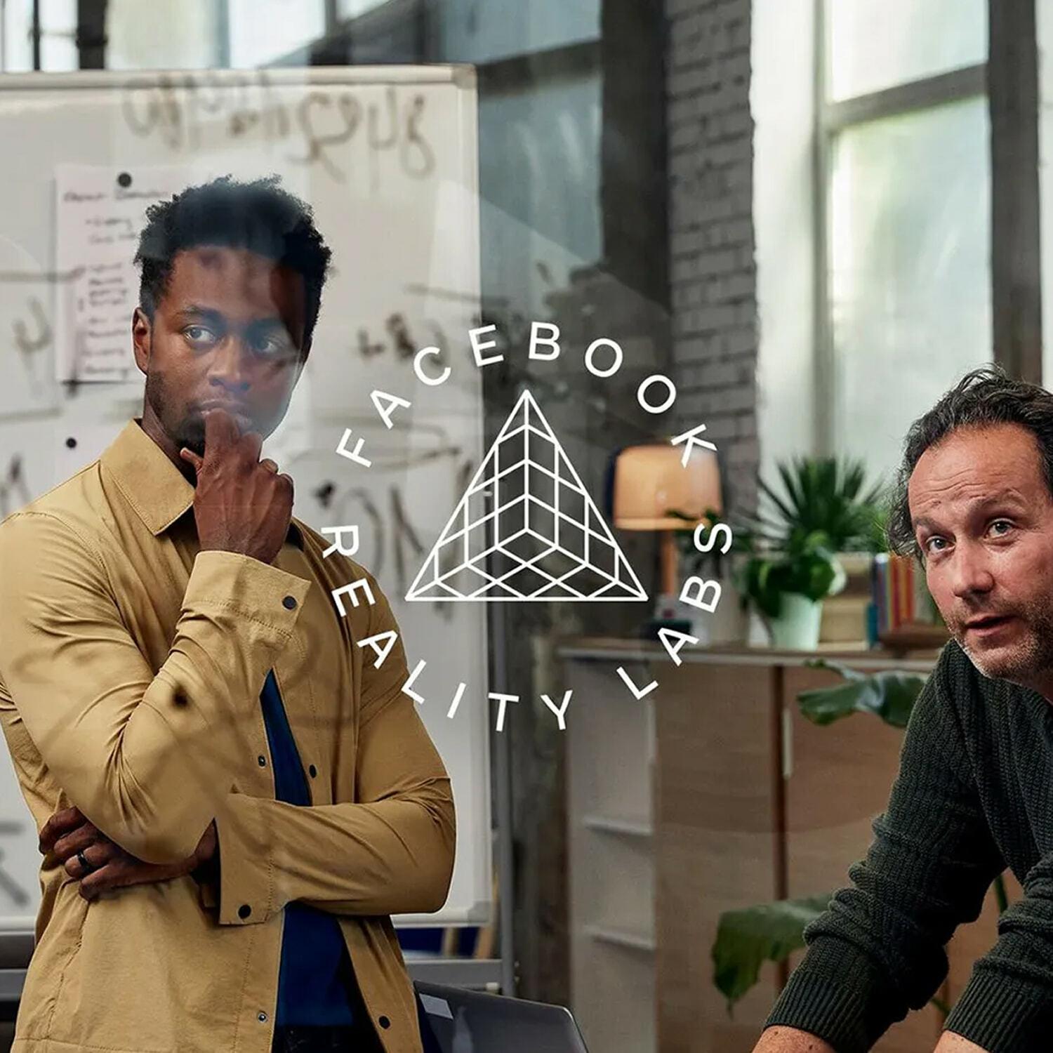Facebook Reality Labs logo over two people in a modern office