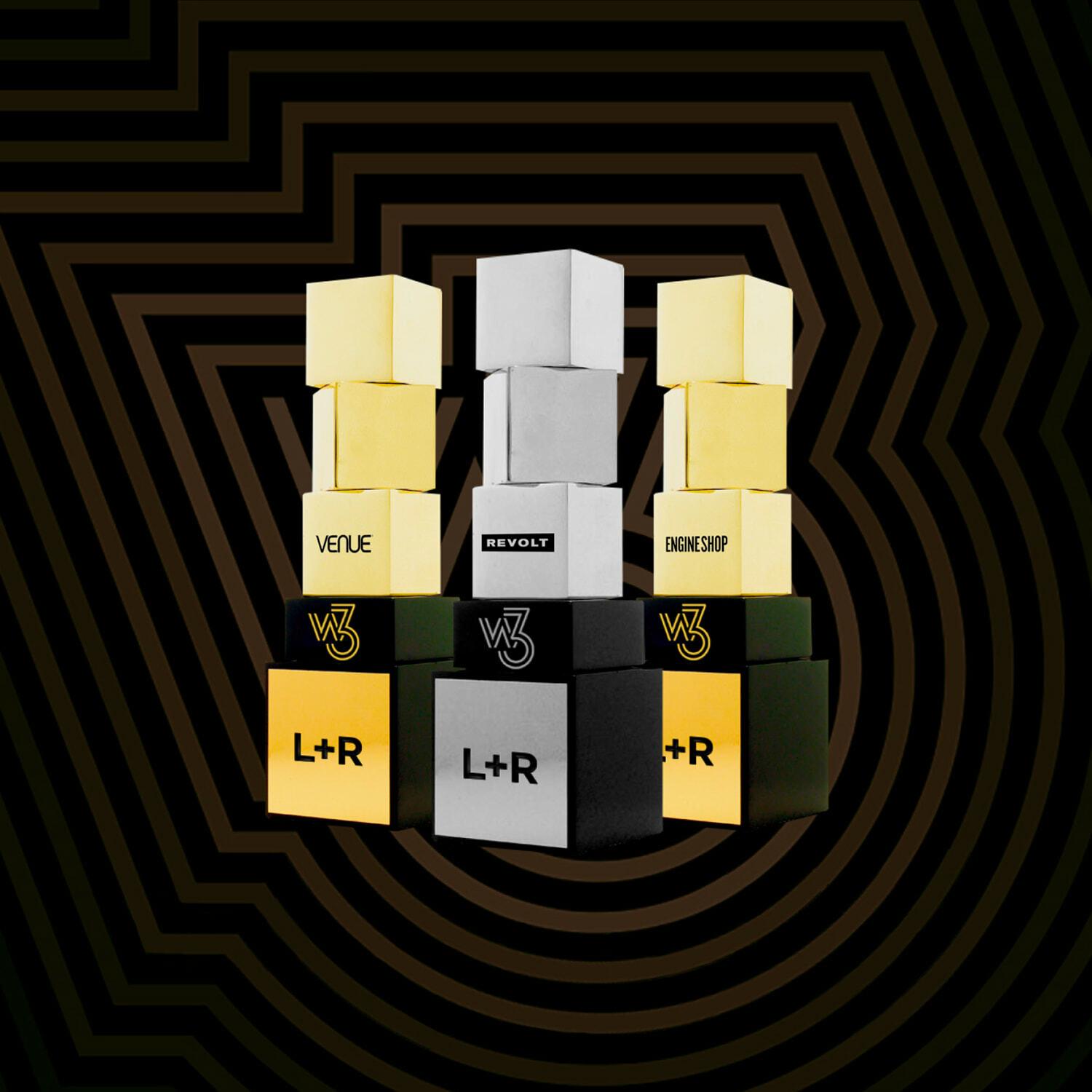 Stacked W3 award cubes labelled Venue, Revolt, Engineshop and L+R.
