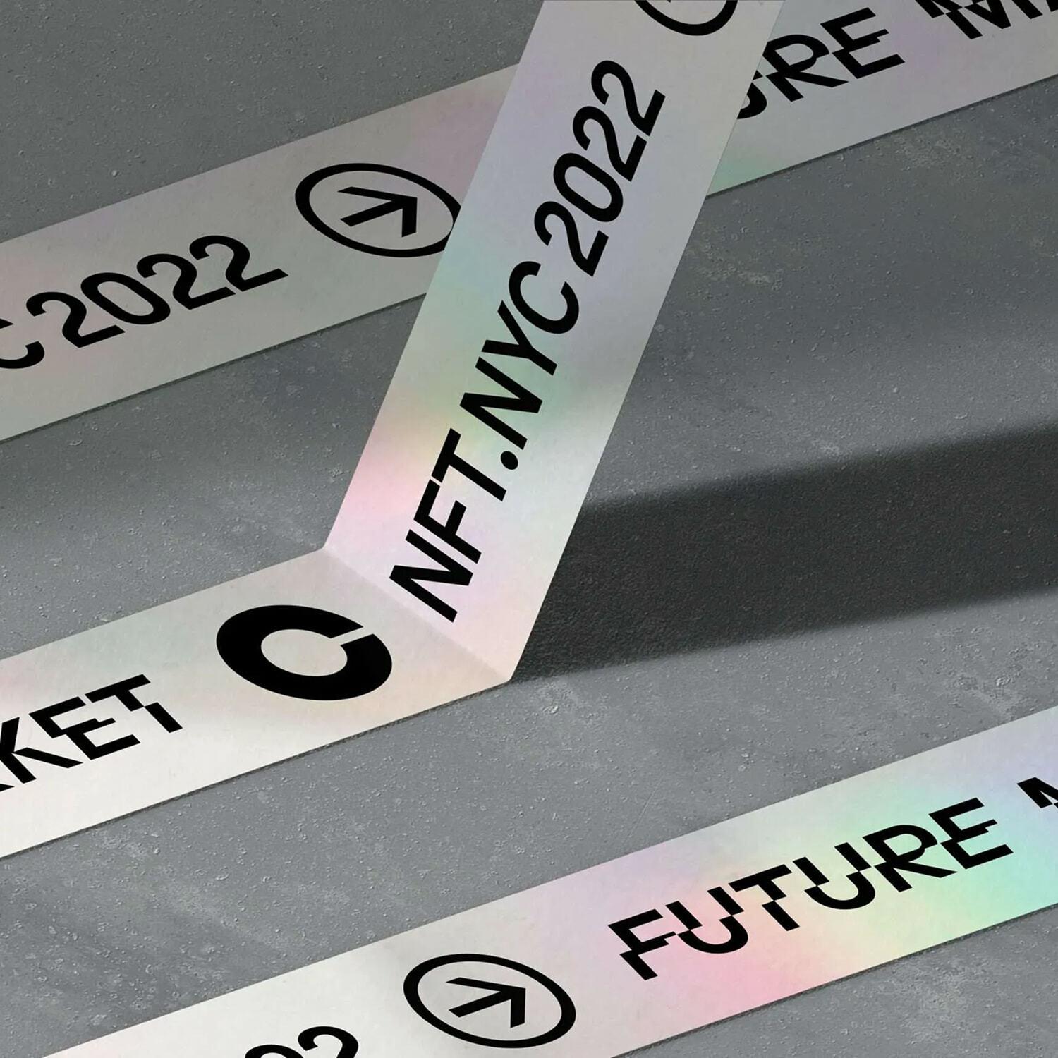 Iridescent event bands reading NFT.NYC-2022 and Future