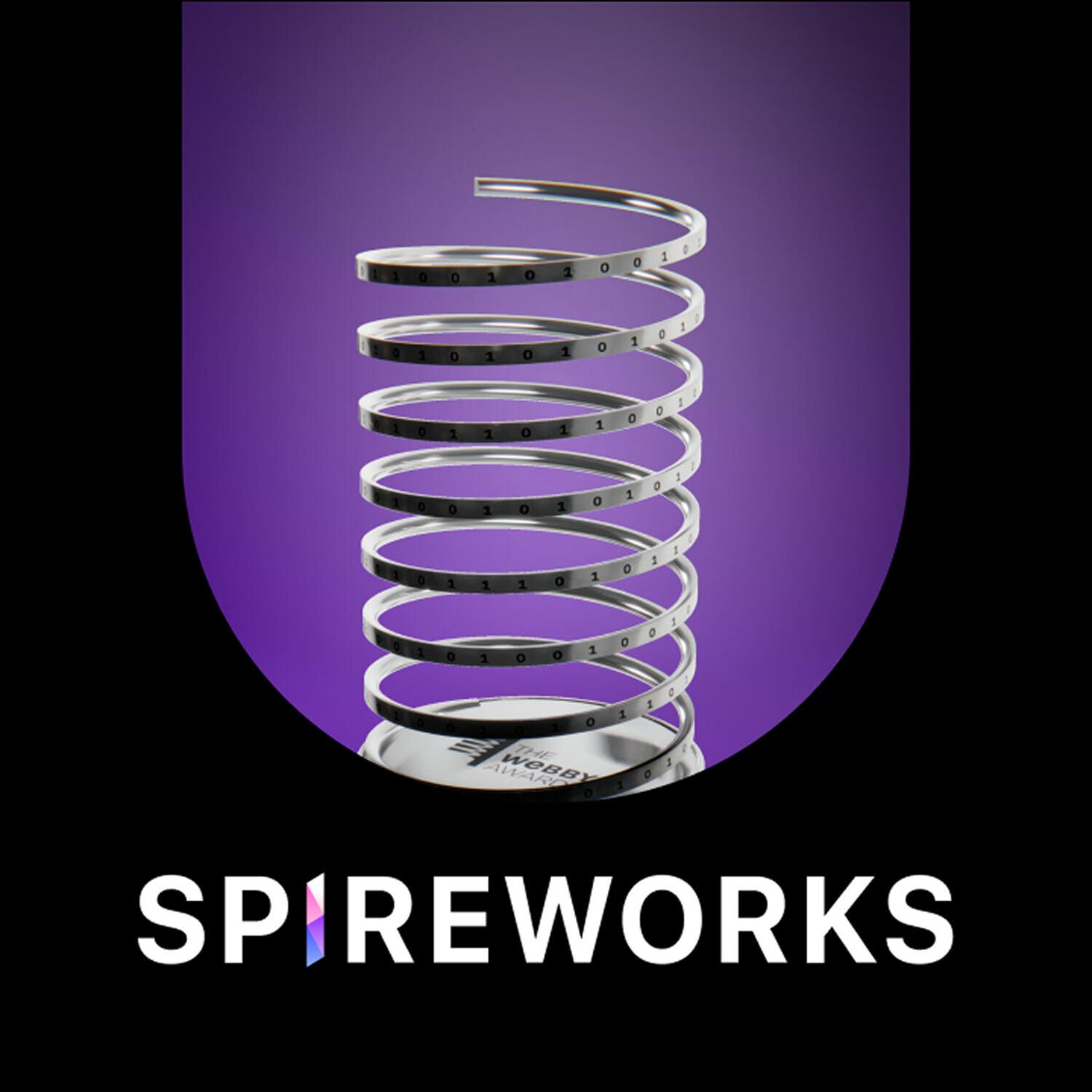 Webby Award trophy engraved with binary above the Spireworks wordmark