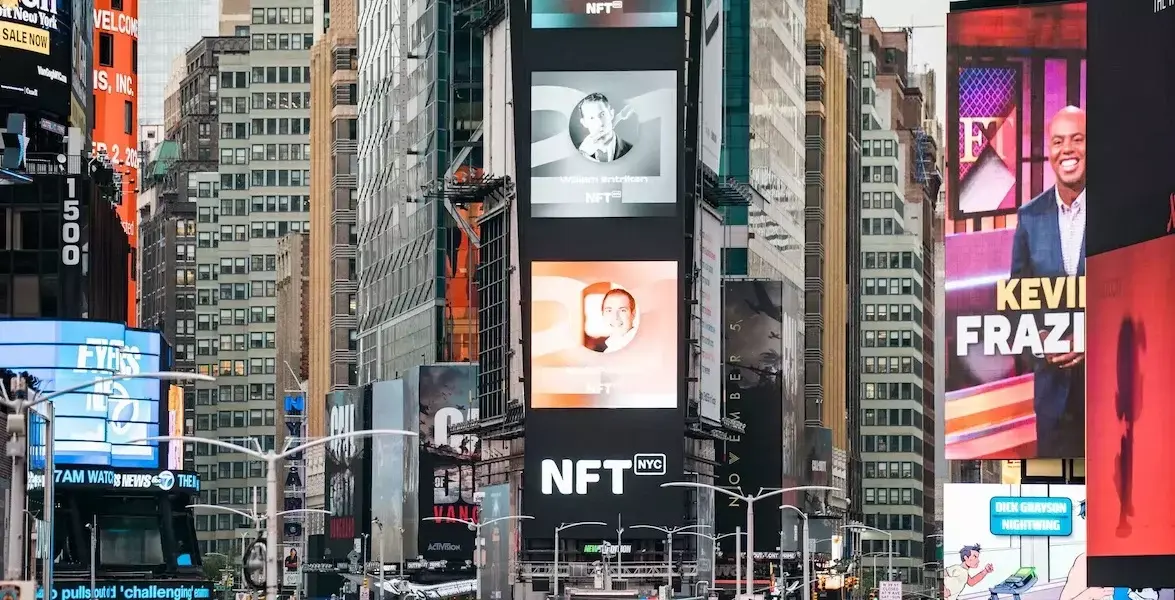 NFT.NYC billboards lighting up Times Square.