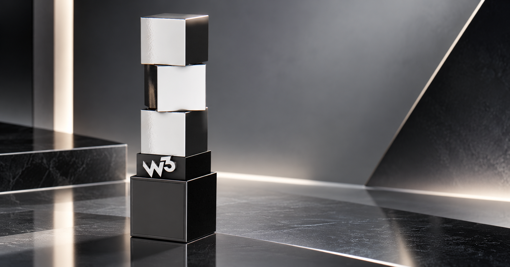 W3 Silver award statuette in a sleek dark studio setting.